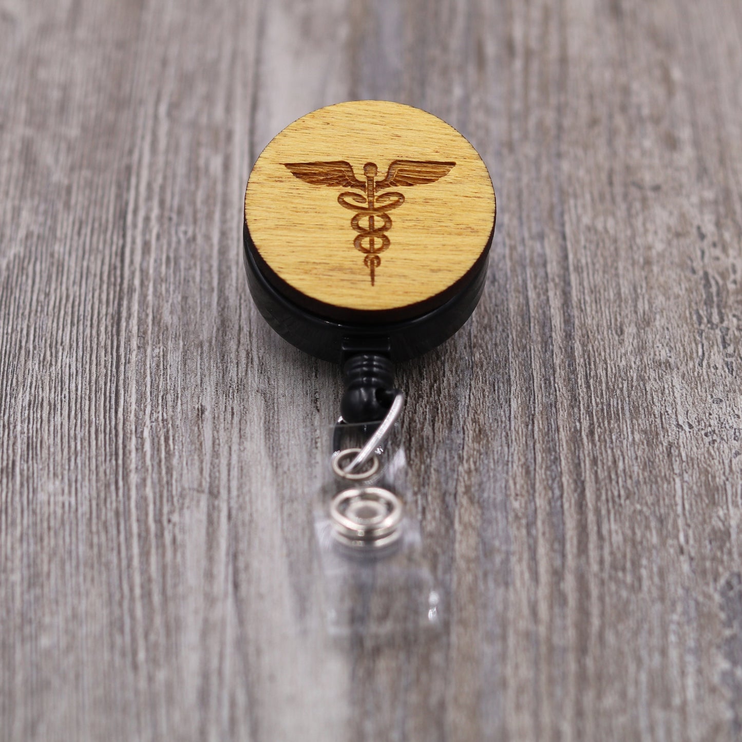 Caduceus Badge Reel